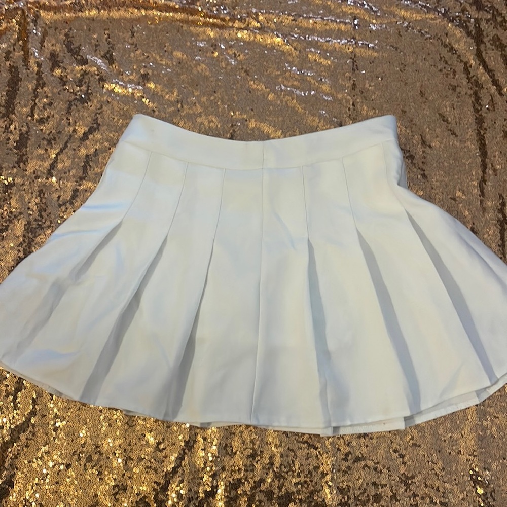 White pleated skort